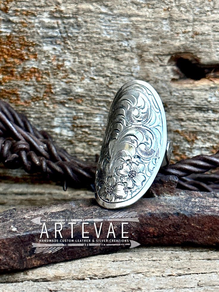 Hand engraved wrap ring by Tamra at ArteVae. Easily sizeable from approximately a size 7 to a 9.5. It is especially beautiful worn on an index finger allowing all the design to be displayed. Western Engraved Jewelry, Western Ring, Silver Initial Ring, Western Rings, Western Style Outfits, Index Finger, Wrap Ring, Initial Ring, Western Jewelry