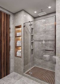 a walk in shower sitting next to a wooden shelf filled with white towels on top of a tiled floor