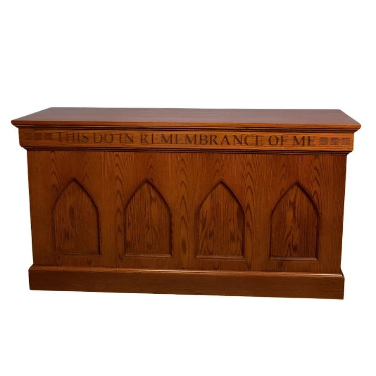 a wooden casket with the words this is an remembrance of me on it's side