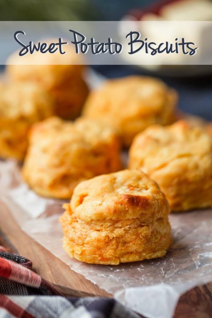 sweet potato biscuits on a cutting board with text overlay that reads, sweet potato biscuits