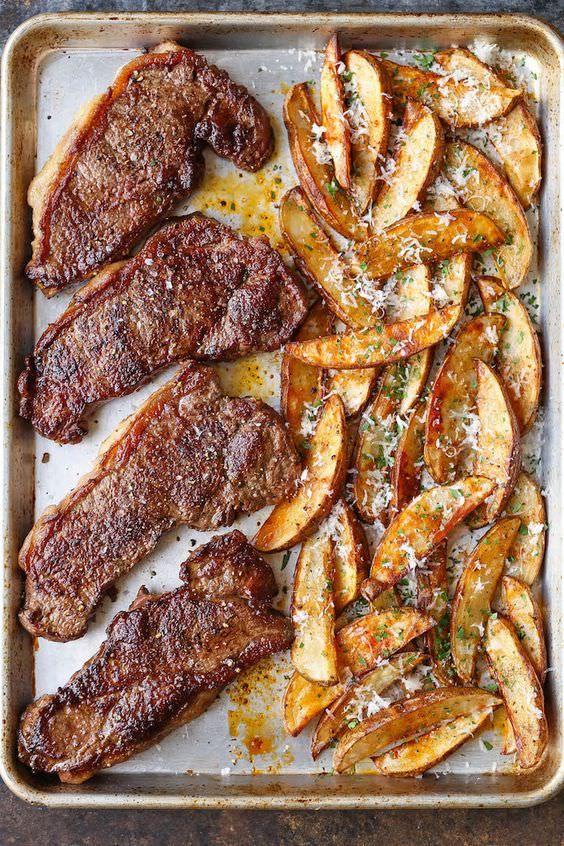 steak, potatoes and parmesan cheese on a baking sheet with text overlay