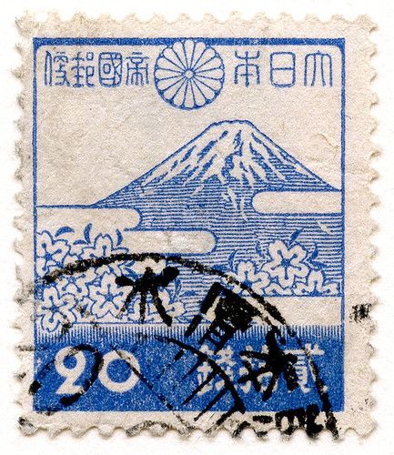 a stamp with the image of mount fuji on it