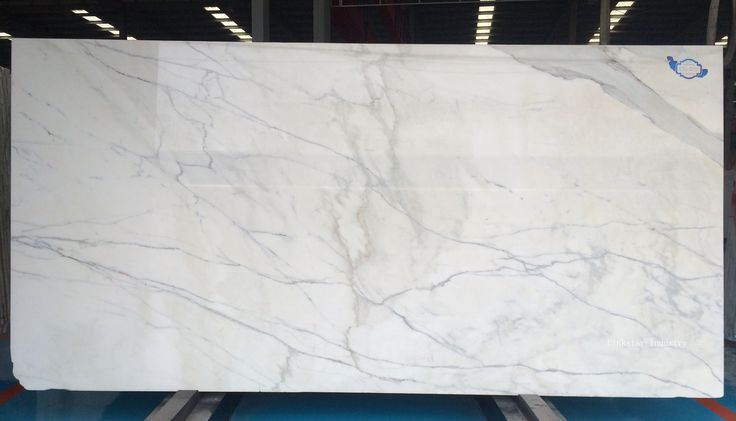 a large white marble slab in a warehouse