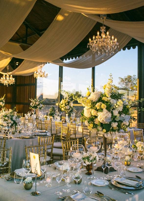 the tables are set for an elegant wedding reception