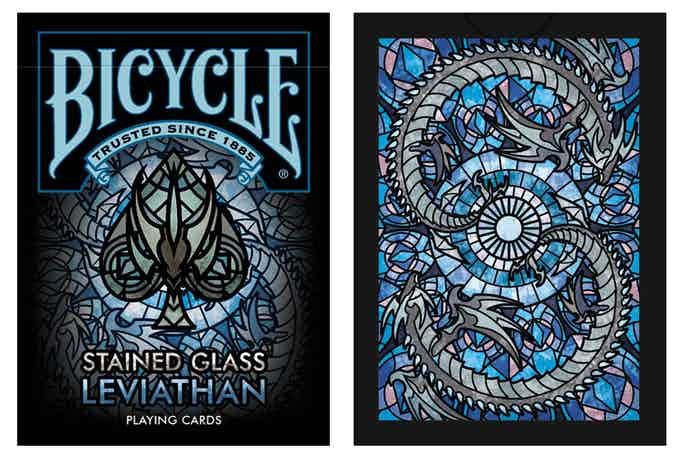 two cards with stained glass designs on the front and back covers for bicycle's stained glass levihathan playing cards