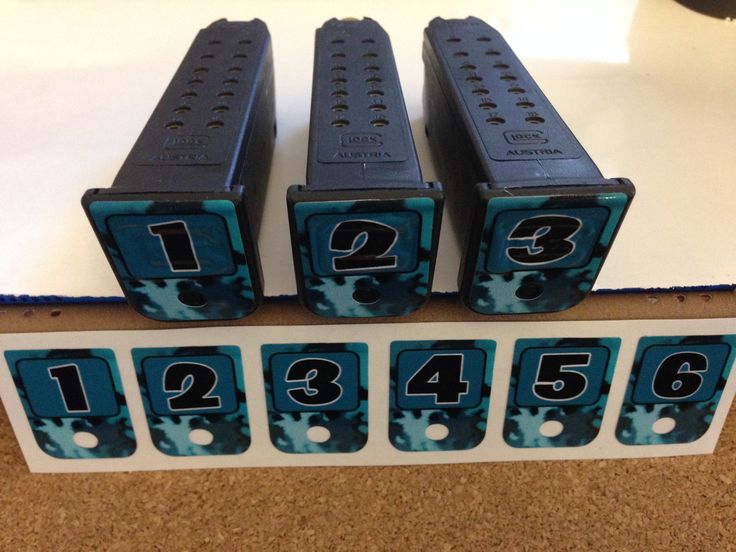 four black and blue numbered numbers on a table