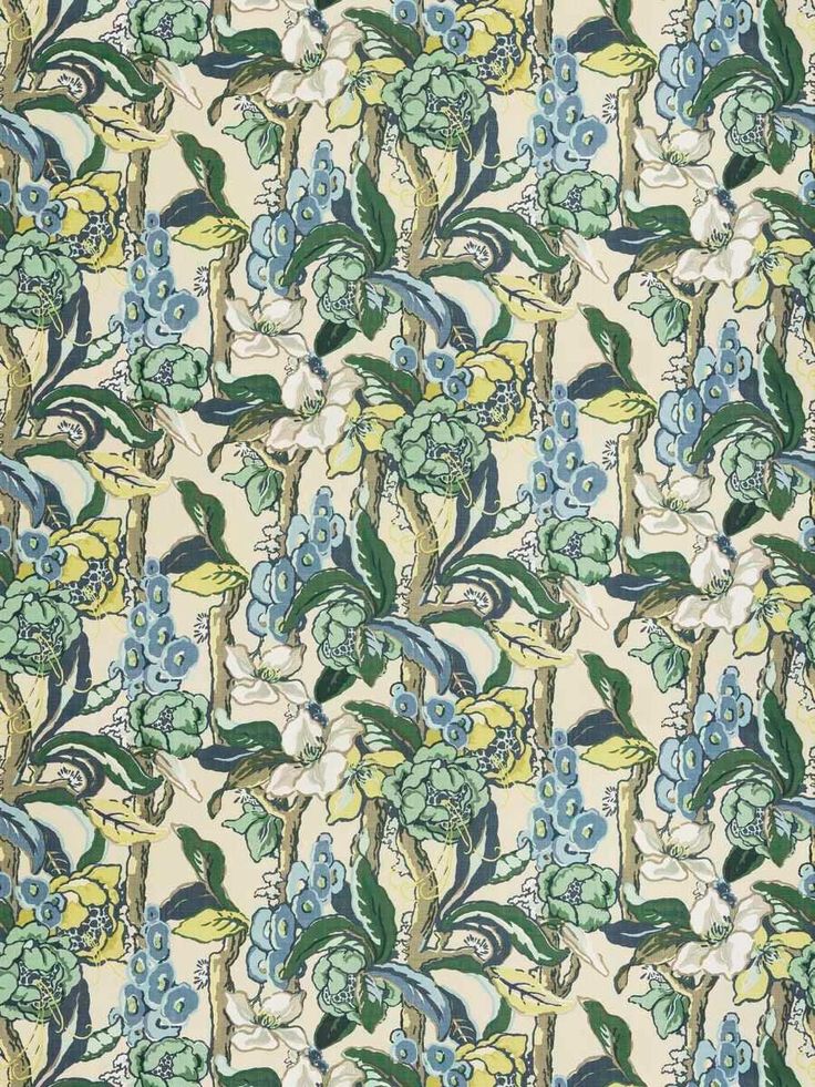 an old wallpaper with blue flowers and green leaves