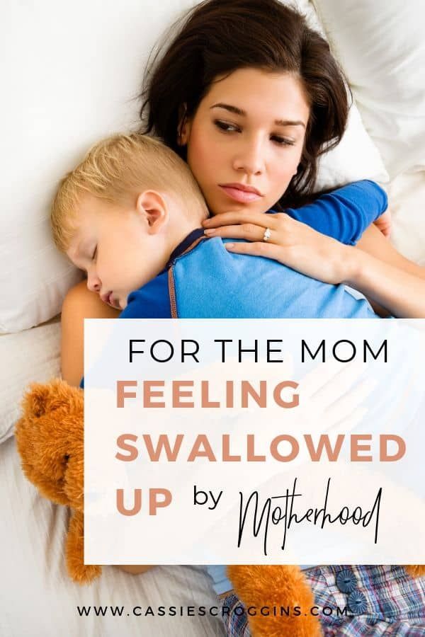 a woman is sleeping with her child on her back and the words for the mom feeling swallowed up by motherhood