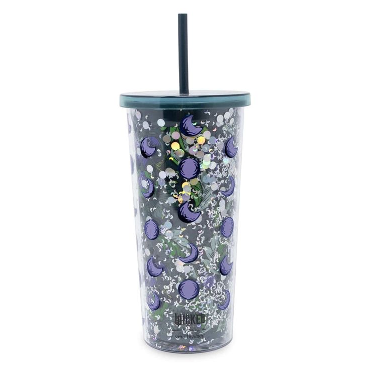 the tumbler is decorated with purple flowers and green leaves, along with a black straw