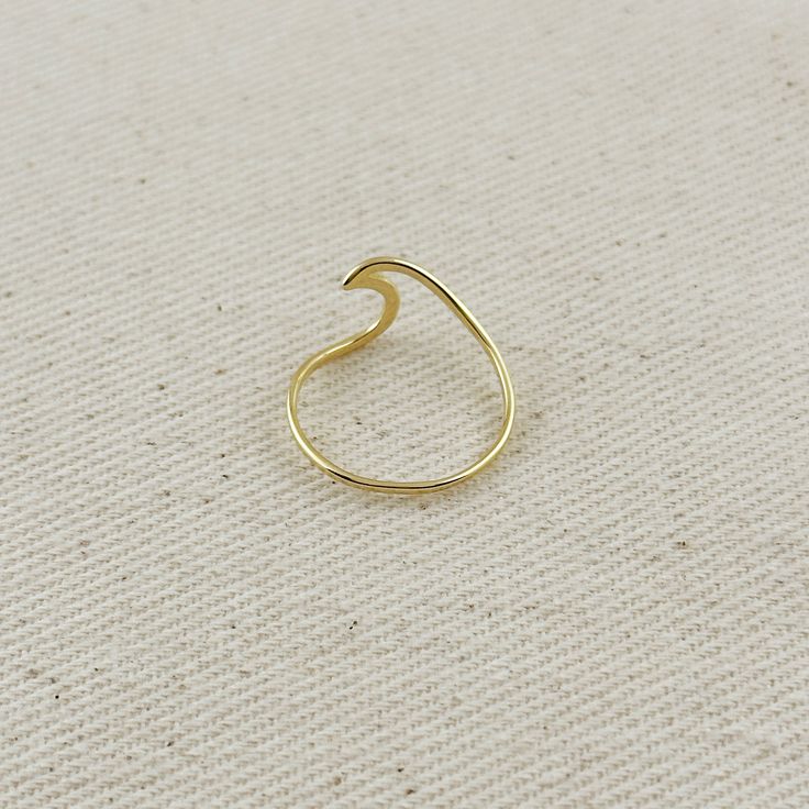 Embody the ocean's eternal movement with our enchanting Wave Ring. Featuring fluid lines that mirror gentle ocean ripples, this elegant piece brings natural rhythm to your collection. The continuous wave pattern creates a mesmerizing three-dimensional effect that catches light beautifully as it moves. Perfect for beach lovers and those drawn to coastal beauty, this ring serves as a wearable reminder of the sea's timeless allure. Whether worn alone or stacked, it adds a touch of maritime charm to Ocean Ripples, Croissant Earrings, Croissant Ring, Hand Chain Bracelet, 18k Gold Chain, Pearl Shop, Wave Ring, Hypoallergenic Jewelry, Zodiac Necklaces