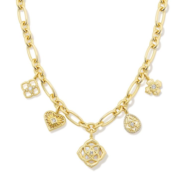 The Lacie Statement Charm Necklace will have you charmed, we're sure. An adorable assortment of sweet hearts and medallion shapes inspired by the Kendra Scott logo, this playful necklace is a contemporary take on a nostalgic jewelry trend. To preserve your fashion jewelry for years to come, agents such as soaps, perfumes, lotions, makeup, hair and cleaning products, and other chemical contact should be avoided. Take care to remove jewelry before showering, sleeping, exercising or swimming. Kendr Chunky Charm Necklace, Nostalgic Jewelry, La Jewelry, Senior Szn, Customized Necklace, Xmas Wishlist, Zodiac Pendant Necklace, Sweet Hearts, Style Goals