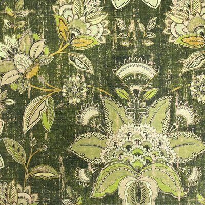 a green and white floral pattern on fabric