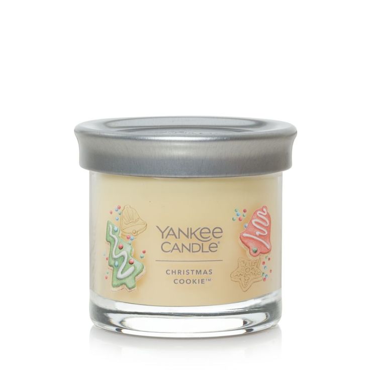 yankee candle christmas cookie in a glass jar on a white background with the lid open