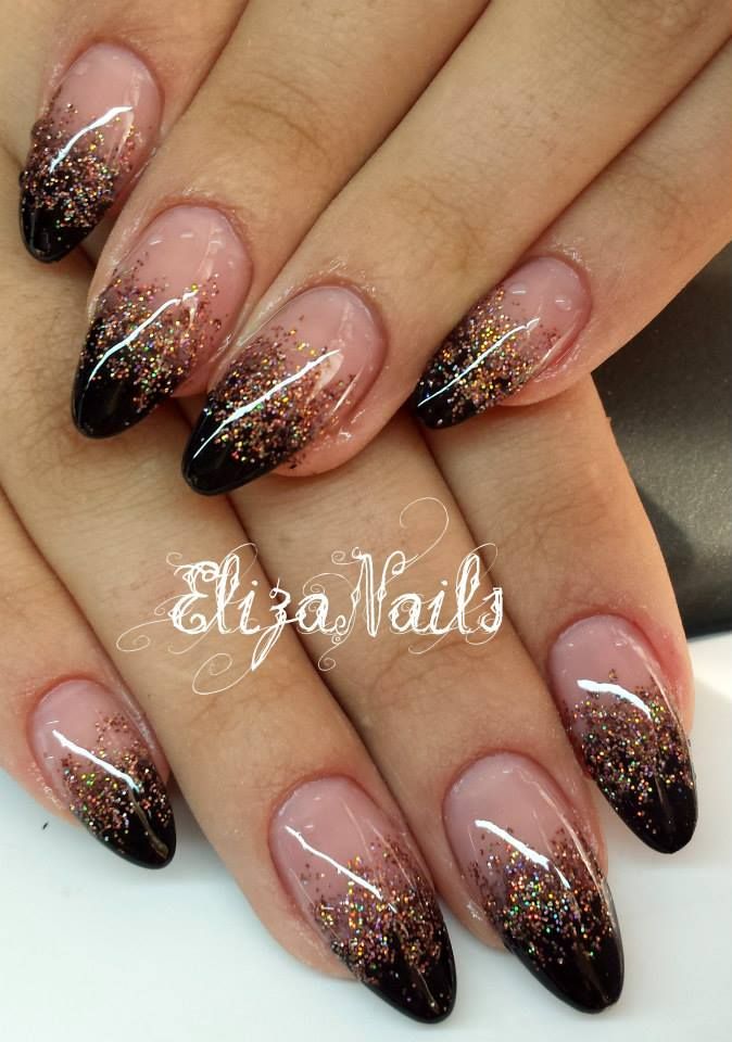 Black To Gold Ombre Nails, Brown Black Gold Nails, Gold Nails Black Tips, Black Tip Glitter Nails, Black And Gold Nails Oval Shape, Red Gold Ombre Nails Glitter, Black Nails With Gold Glitter Ombre, Nail Art Design Black And Gold, Gel Nails Black And Gold