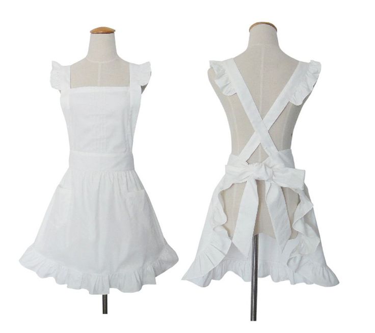 two mannequins dressed in white dresses with ruffles on the sides