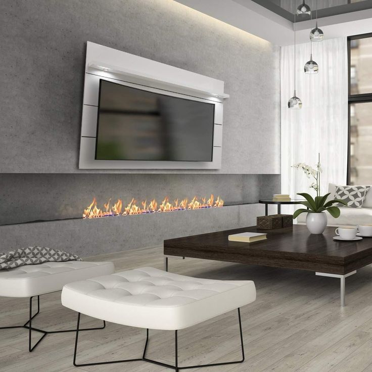 a modern living room with a fireplace and tv mounted on the wall above it's mantle