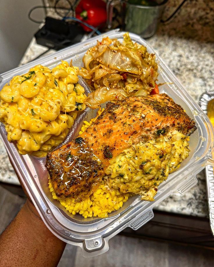 a plastic container filled with food on top of a counter