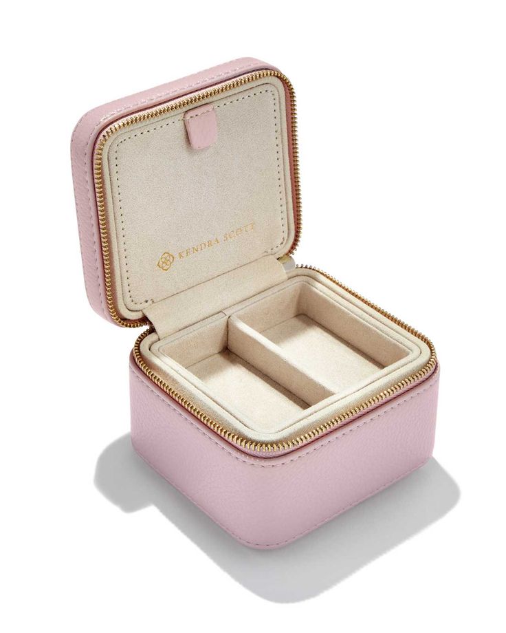 an open pink box with two compartments