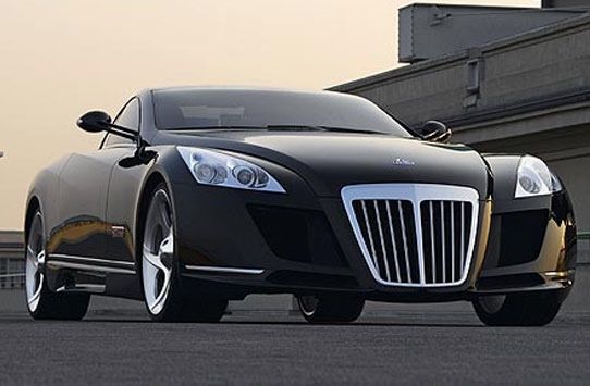 a black car parked in front of a building