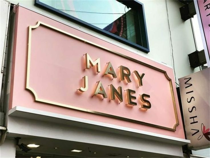 the marquee for mary janes is pink and gold