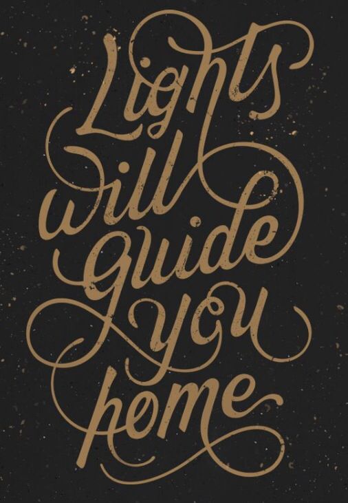 the words, lights will guide you home on a black background with gold foil lettering