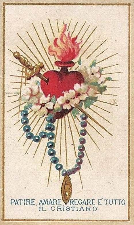 an old postcard with a heart and cross on it's front, surrounded by flowers