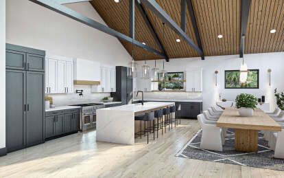 a large open concept kitchen and dining area with wood ceilinging, white cabinets, gray countertops, and wooden floors