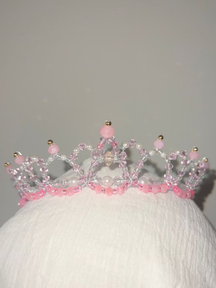 This is a beautiful Tiara headpiece that would look best with any soft or gentle variation.  (It can be use for any though of course 😊).  Hand made with lots of love and care. Details: - supplies: ($30) - time to get the right supplies and set them up right: 2 hr ($14) - time to make the tiara: 4 hr ($28) (not accounting for time to ship, cost of shipping materials.  ALSO charging $7 an hour- HALF of minimum wage) Plastic Tiara, Pink Princess Tiara, Barbie Tiara Crowns, Barbie Swan Lake Tiara, Barbie Swan Lake Crown, Ballet Tiaras, Tiara Headpieces, Beautiful Tiaras, Fairy Dolls