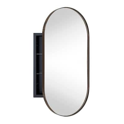 an oval mirror mounted to the side of a wall next to a black cabinet and shelf