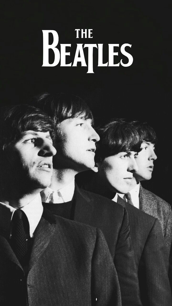 the beatles poster with three men in suits