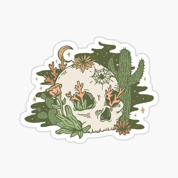 a sticker with an image of a skull and cacti in the background