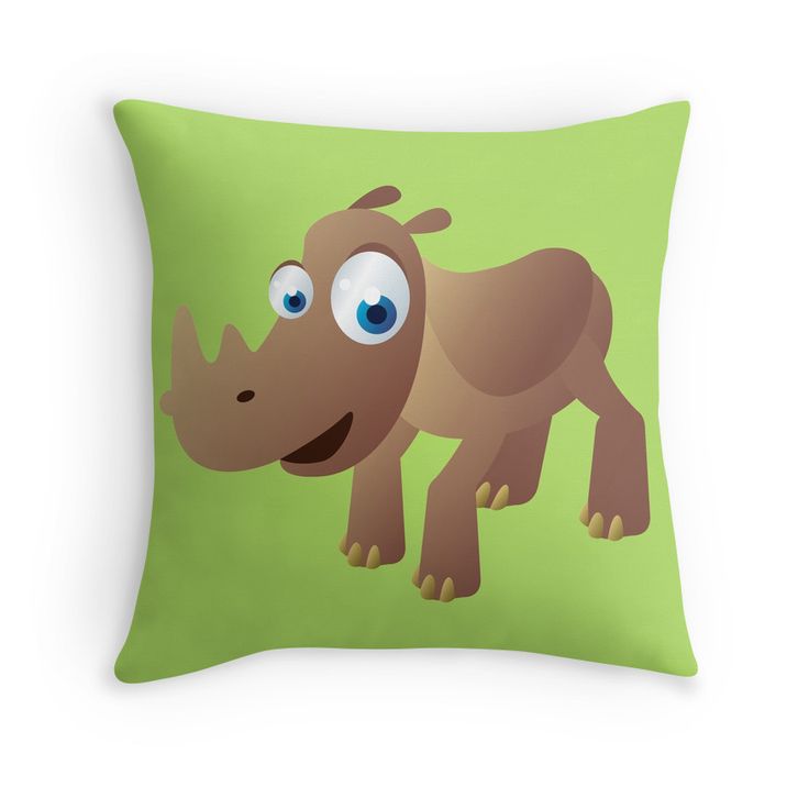 a green pillow with a cartoon rhinoceros on it's front and side