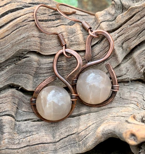 Cooper Earrings Handmade, Copper Jewelry Necklaces, Bronze Wire Wrapped Round Earrings, Bronze Wire Wrapped Teardrop Earrings, Hand Forged Brown Earrings As A Gift, Bronze Wire Wrapped Drop Earrings, Antique Teardrop Ear Wire Jewelry, Adjustable Rustic Metal Earrings, Vintage Hand Forged Copper Earrings