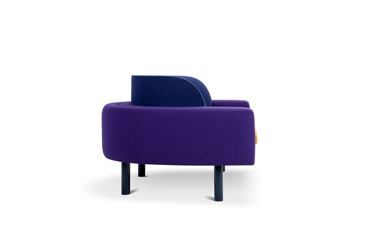 a purple and blue chair sitting on top of a white floor