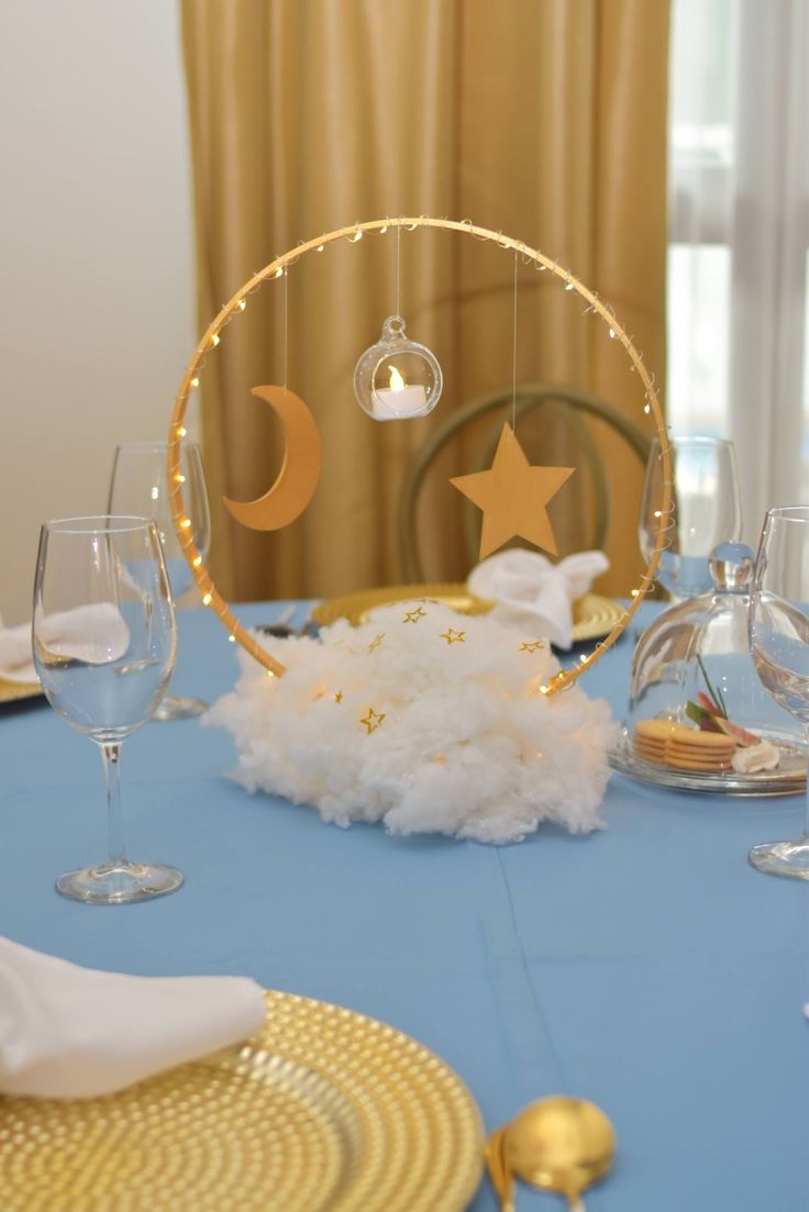 a blue table cloth with stars and moon decorations