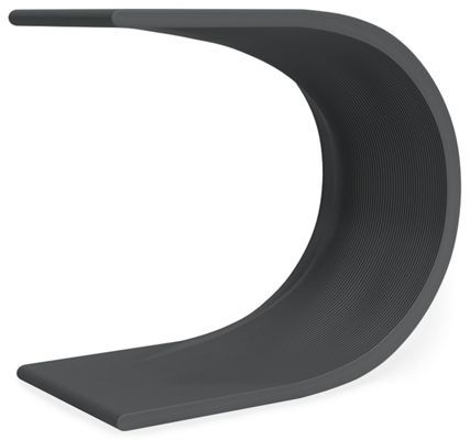 the curved shelf is made out of black plastic