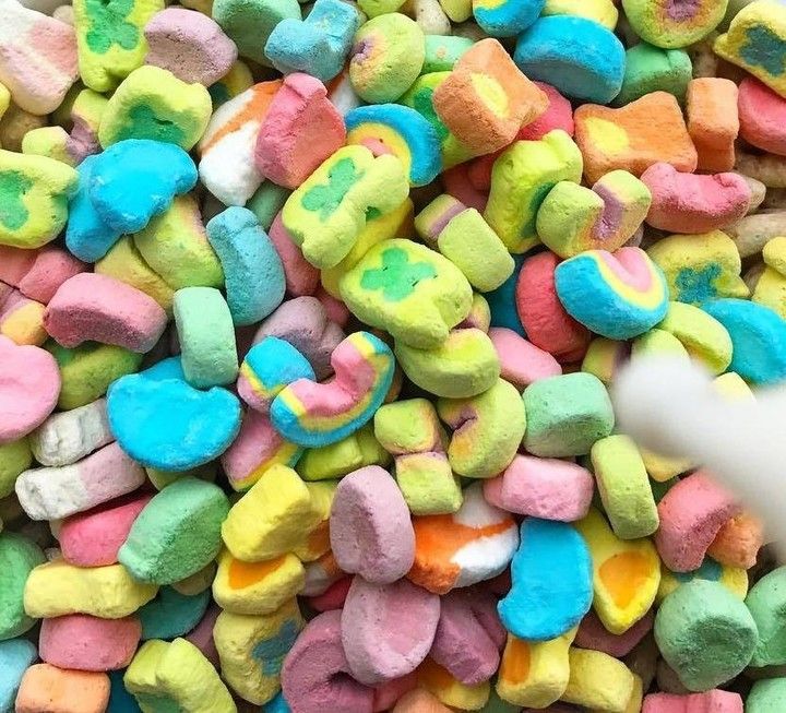 a pile of marshmallows that are colorful