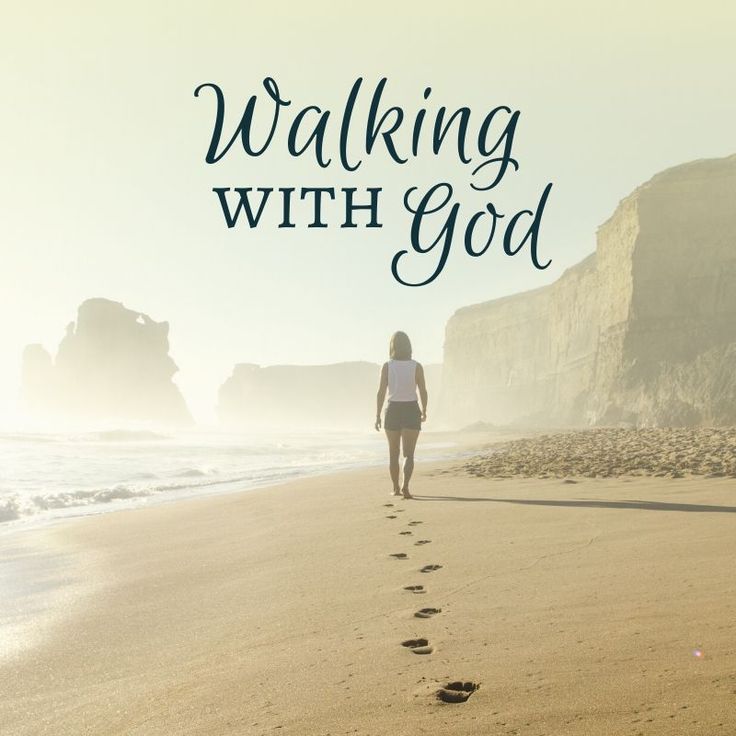 a woman walking on the beach with footprints in the sand and text that reads, walking with god