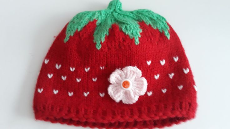 Knitted Strawberry Fruit Hat - Hand Knit Hat - Strawberry Beanie Hat  This strawberry slouchy beanie is very fun and great for winter season.  Here also with the small strawberry blossom on the side, which can also be removed if necessary. All items are made individually according your personal measures in 5-7 days! ..For perfect fit and the most comfortable wearing :) Looking for a custom size, color?  We can accommodate from baby to adult and everyone in between, so just pop us a message and we'll create the perfect beanie for you! Women: 19 - 24 inches. Length 8 inches Men: 21 - 26 inches. Length 9 inches Cute One Size Hat, Casual Knitted Hats As A Gift, Casual Knitted Hats As Gift, Casual Knitted Hats For Gifts, Cute One-size Knitted Bonnet, Cute Hand Knitted Winter Bonnet, Cute Beanie Hat One Size Fits Most, Cute Knitted Yarn Beanie, Cute Beanie Hat, One Size Fits Most