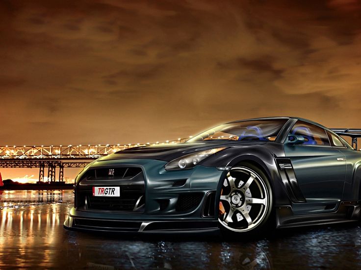 a black sports car parked in front of a bridge at night with the lights on