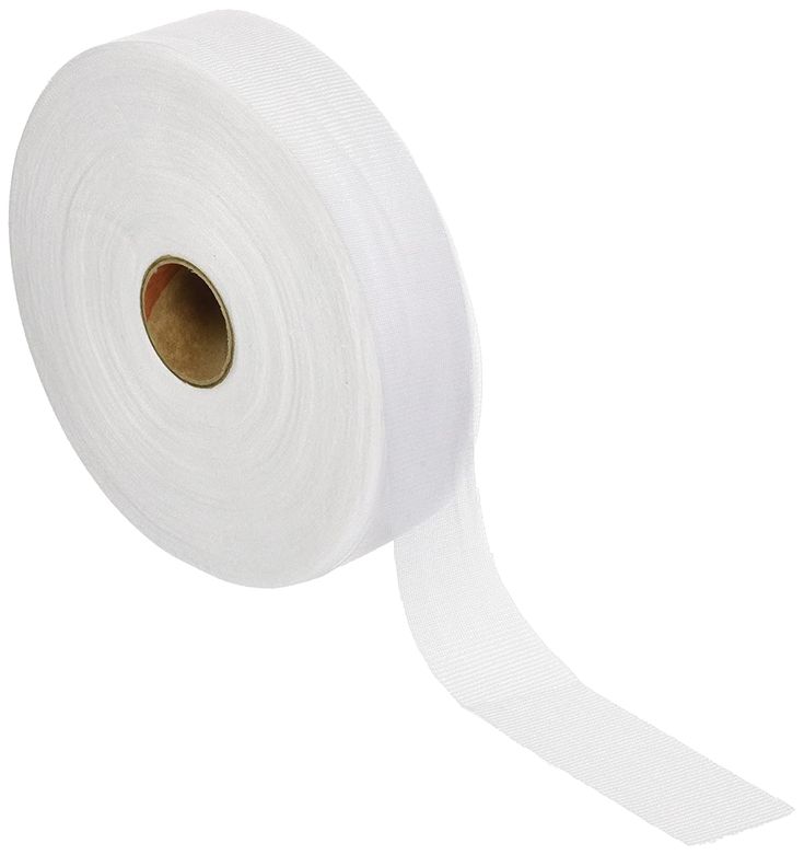 a roll of white tape on a white background