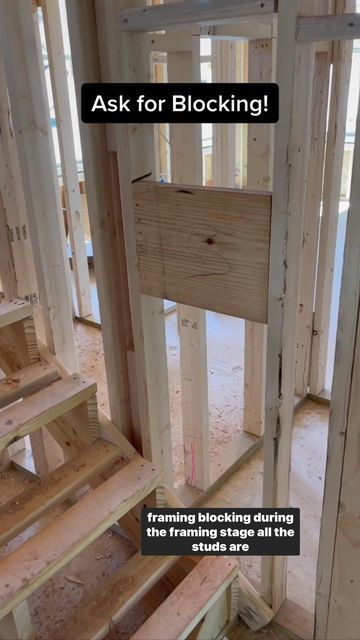 the inside of a house being built with wooden framing