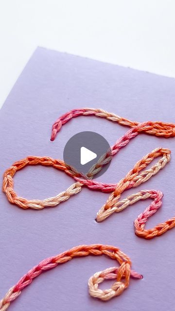 the video is showing how to make an octopus string art project with yarn and scissors