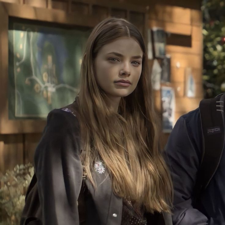 a man and woman standing next to each other