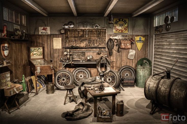 an old fashioned garage filled with lots of tools