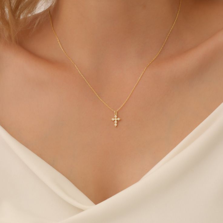 Dainty Diamond Cross Pendant Material: High Quality Solid 925 Sterling Silver THICK plating of 14k Gold, Rose Gold, or Rhodium (Silver) Chain includes a 2" extension for adjustable fit Hollow back design ♡ The most unique jewelry you can find, perfect as a gift for yourself or a loved one. ♡ All of our jewelry is handcrafted with enthusiasm and great care in our workshop. ► How to Care for Your Jewelry Maintain your jewelry's high shine by avoiding contact with chemicals such as soap, perfume, l Dainty Cross Necklace Gold, Soap Perfume, Tiny Cross Necklace, Crucifix Necklace, Tiny Cross, Necklace Cross, Diamond Cross Pendants, Gold Diamond Necklace, Diamond Cross