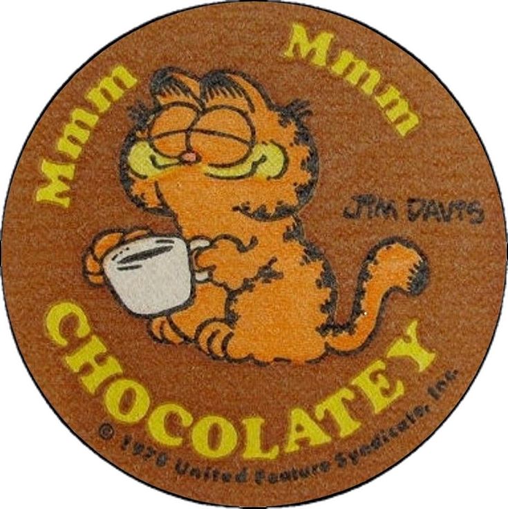 a round coaster with a cartoon cat holding a coffee cup and the words mmmm chocolatey on it