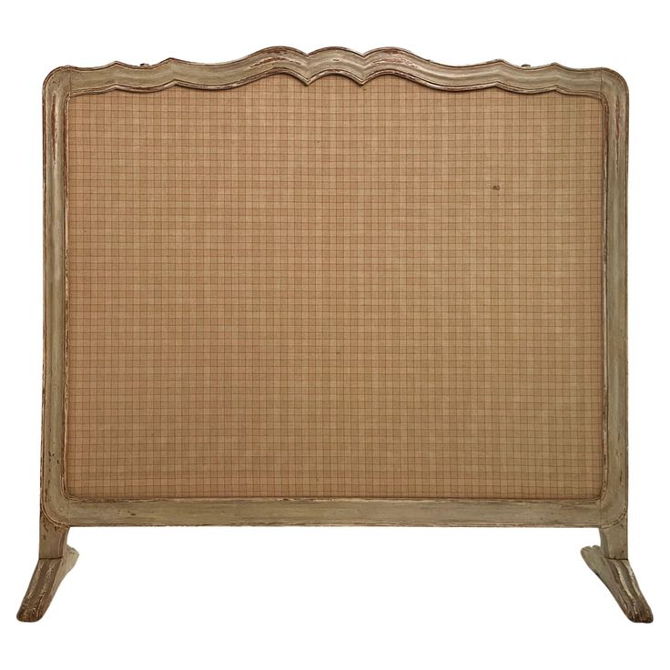 the headboard is made from wood and has a wicker design