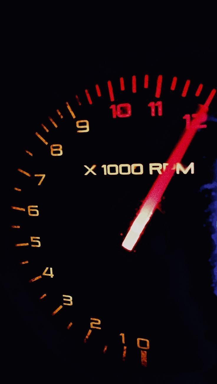 the speedometer is lit up in the dark