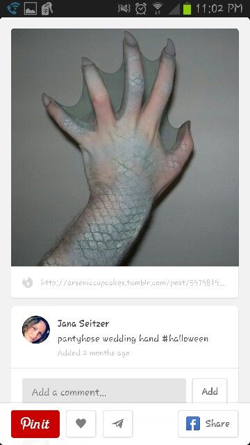 a hand that is covered in white paint